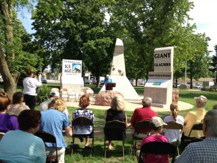 On the SW corner of our round square, Professor George Callison addresses the crowd at the dedication of the Ice Age Monument